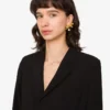 Boucles d&rsquo;oreilles en métal avec perle