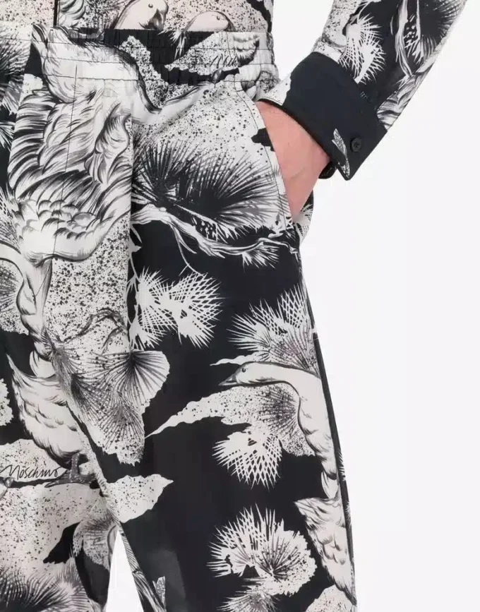 Pantalon léger en popeline de coton avec imprimé oie Pantalon léger en popeline de coton avec imprimé oie