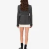 Veste en toile de laine brodée